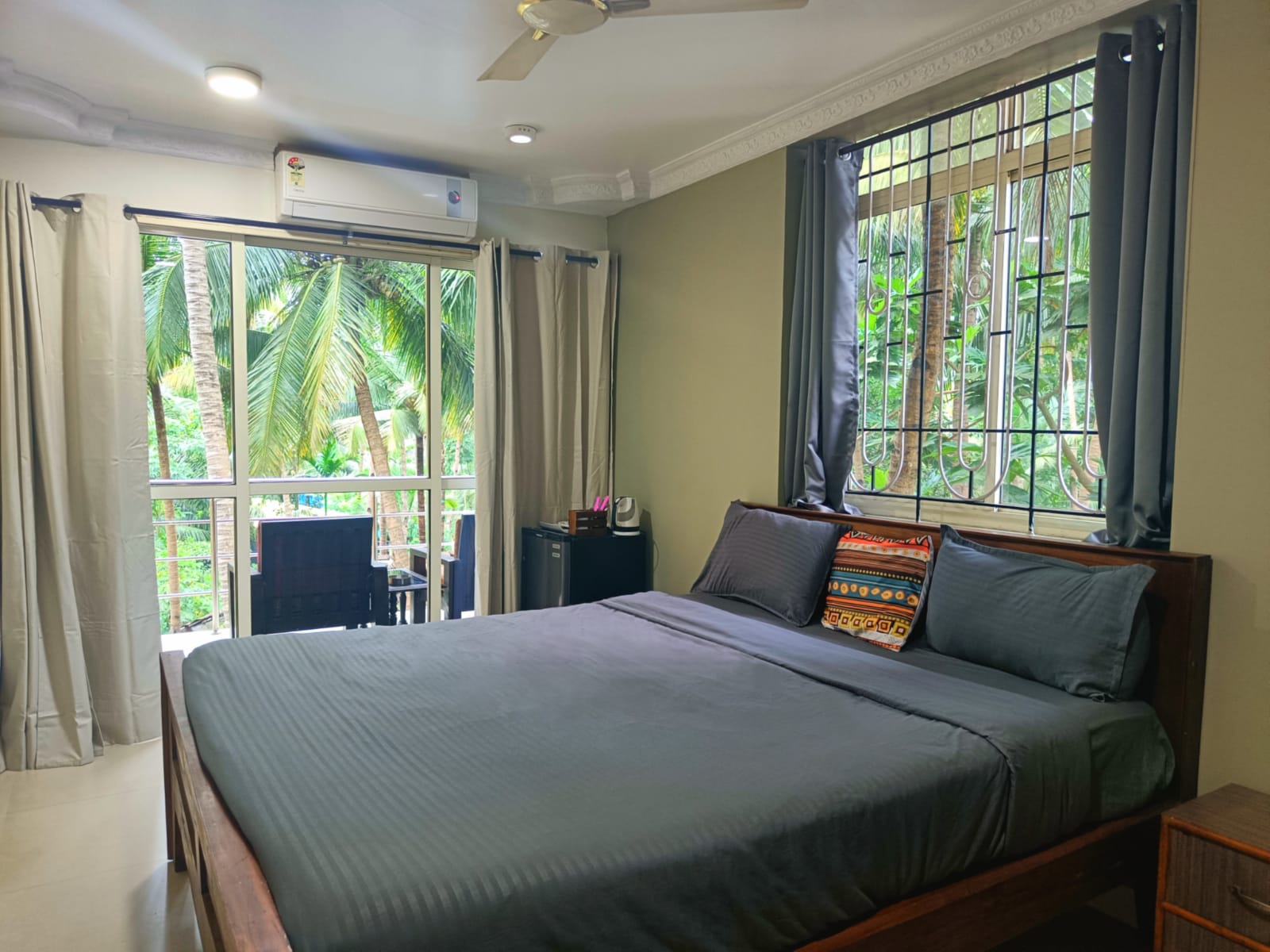 Spacious king bedroom with tropical view at Kanvas Suites Palolem