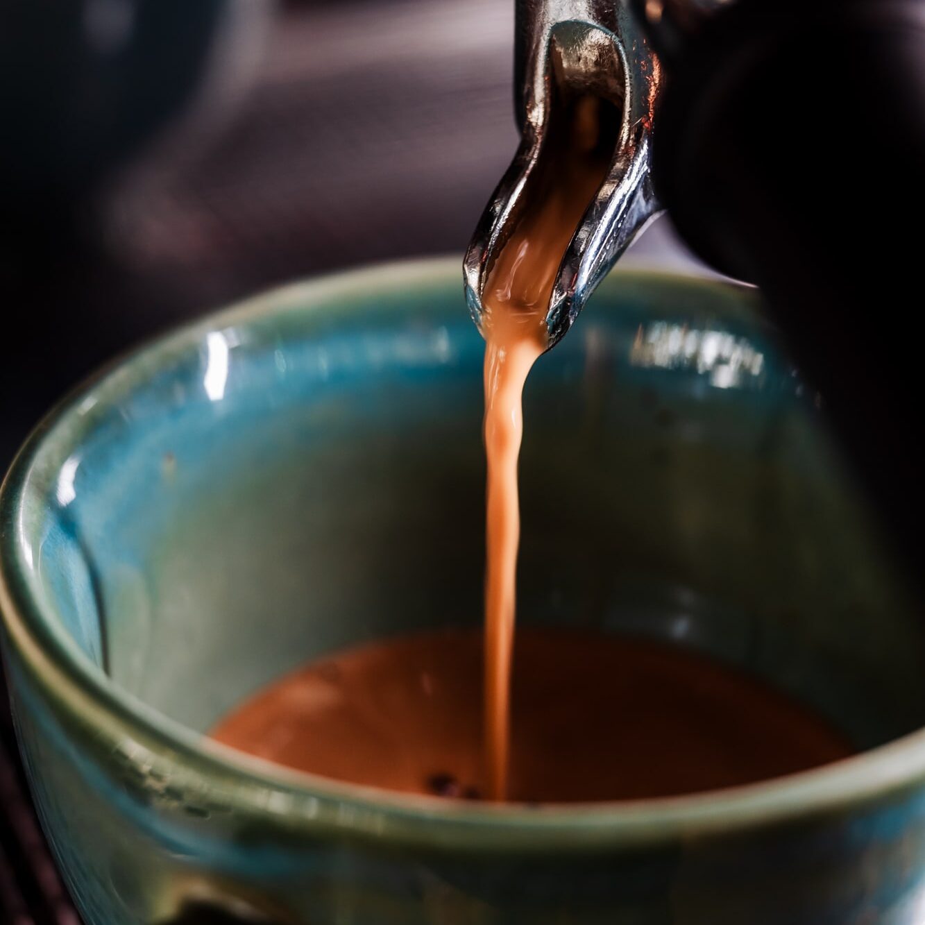 Fresh espresso shot pouring with rich crema at Kanvas coffee shop South Goa