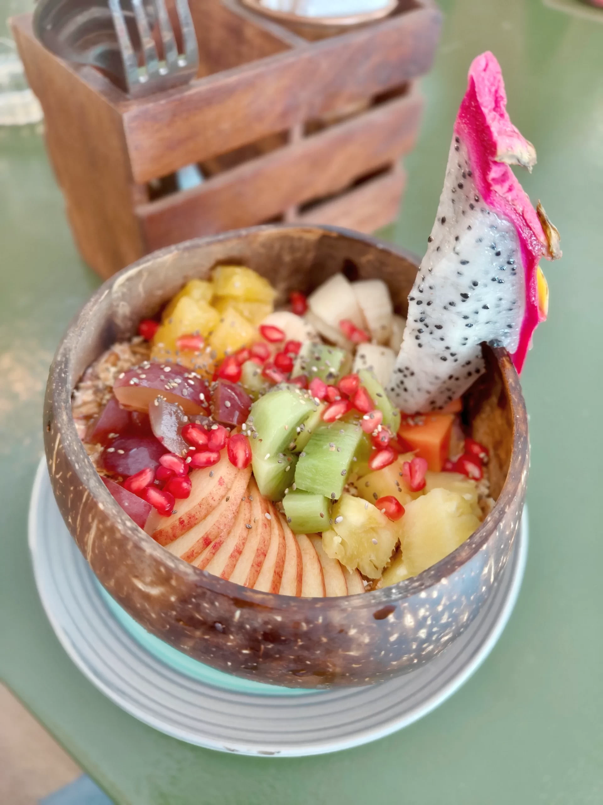 Healthy tropical fruit smoothie bowl, Full English breakfast, and Eggs Royale at Kanvas Cafe Palolem